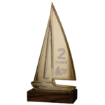 Sailboat-Shaped Statuette on Wooden Base