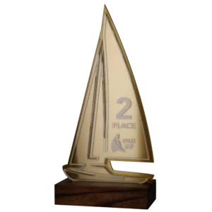 Sailboat-Shaped Statuette on Wooden Base