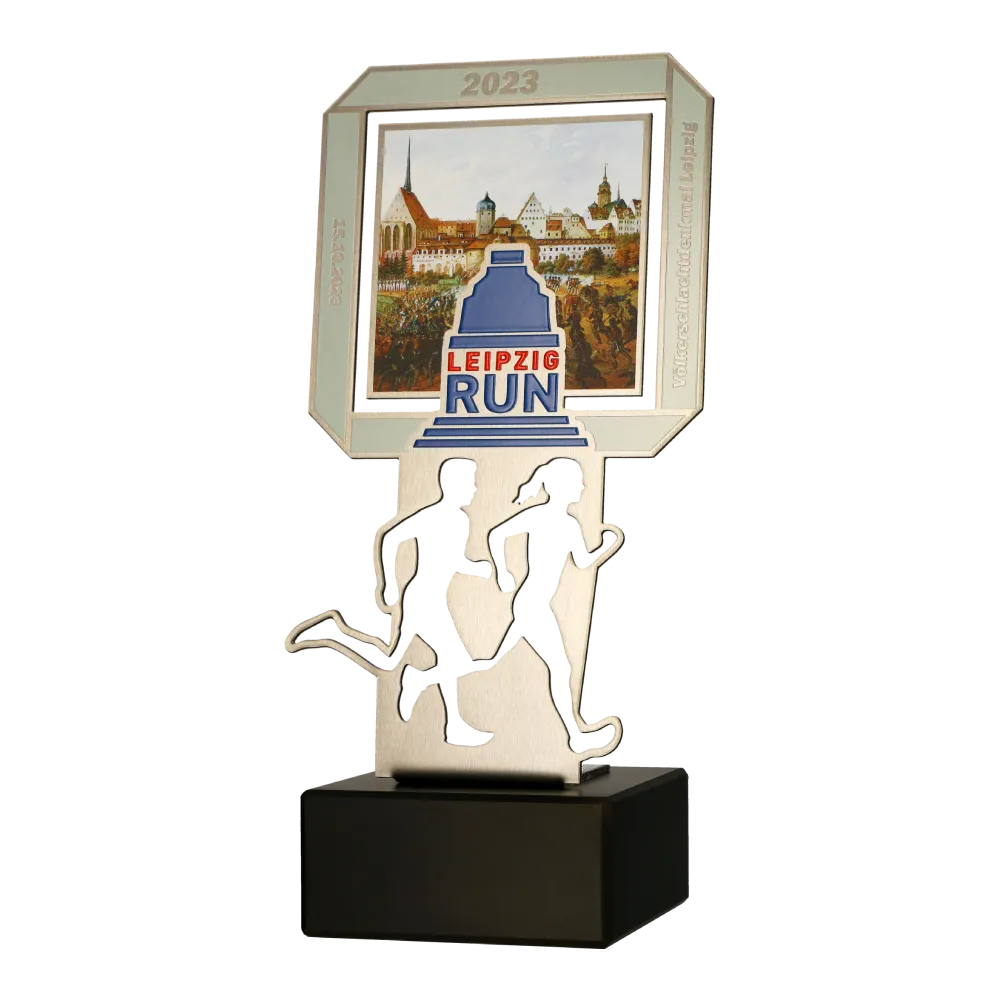 Running statuette with a printed panorama of Leipzig